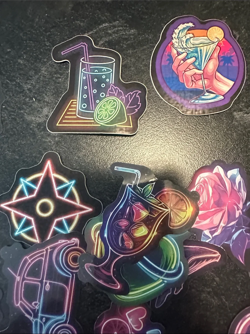 Assorted pack of stickers. Most are 2x2 inches